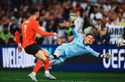 爱游戏网页版-马德里竞技险胜对手，晋级欧冠强