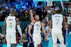 爱游戏tv-美国男篮防守不漏失手篮板球强势取胜